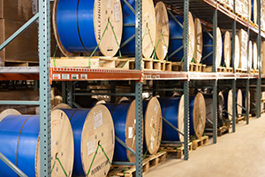 Reels of fiber in the Millennium warehouse.